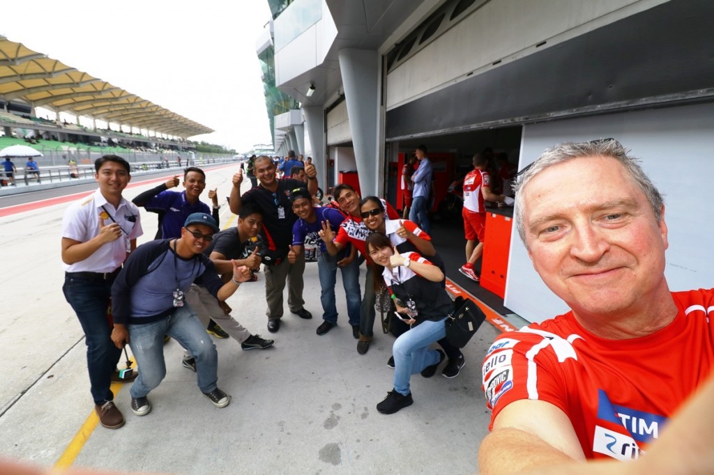 Ducati press officer Julian Thomas taking a wefie for Shell Advance's gu...